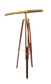 Vintage brass telescope on wood tripod