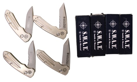 4 Smith and Wesson assorted swat knives with boxes