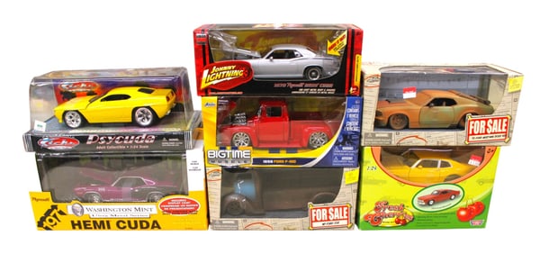 7 Vintage diecast collectible cars in boxes