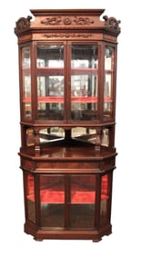 Antique beveled glass carved mahog corner cabinet