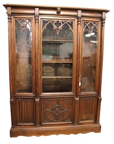 Antique gothic walnut bookcase w/wavy glass & key