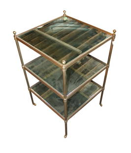 Jansen style quality mirrored 3 tier brass table: Quality mirrored 3 tier brass table in the manner of Jansen, structurally sound and in good condition, glass is good. 28"h x 17.5"w x 17.5"d