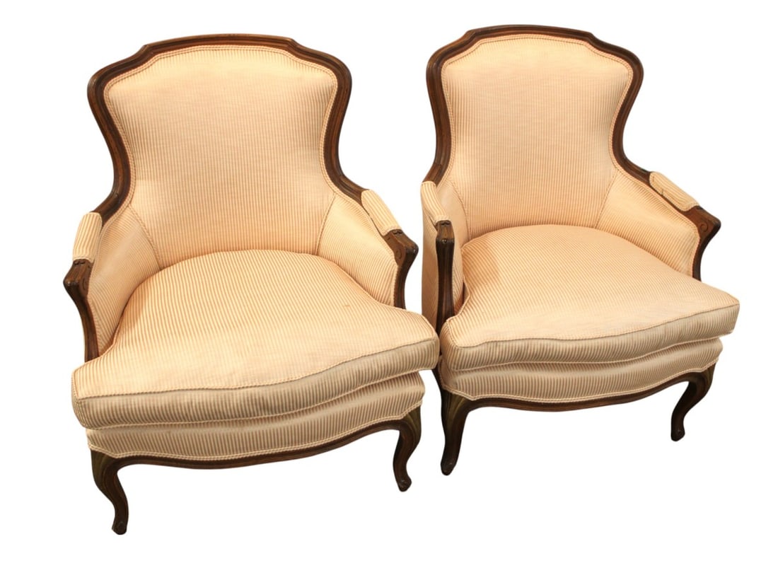 Pair vintage walnut framed and upholstered club chairs: Pair of vintage walnut framed and upholstered club chairs, upholstery looks good, one slight stain see photo, structurally sound. Each 34.5"h x 29"w x 23"d seat height 18"