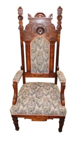 Antique walnut Victorian high back uphol. arm chair