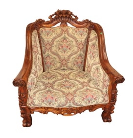 Highly carved and ornate mahogany over-size chair