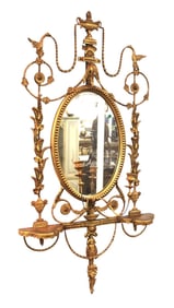Antique French carved and ornate wood and gesso mirror