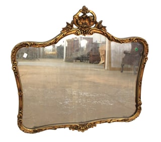 Antique carved wood and gesso mirror