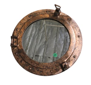 Ship porthole mirror in distressed copper tone finish