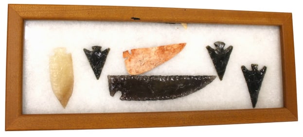 Native American artifacts arrow heads in pine case