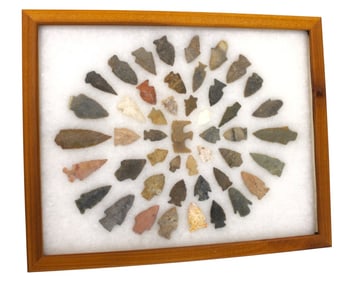 Native Amer artifacts arrow heads in pine case