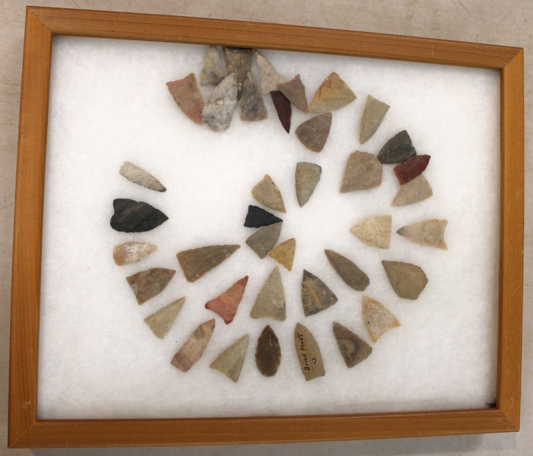 Native American artifacts arrow heads in pine case (1 of 3)
