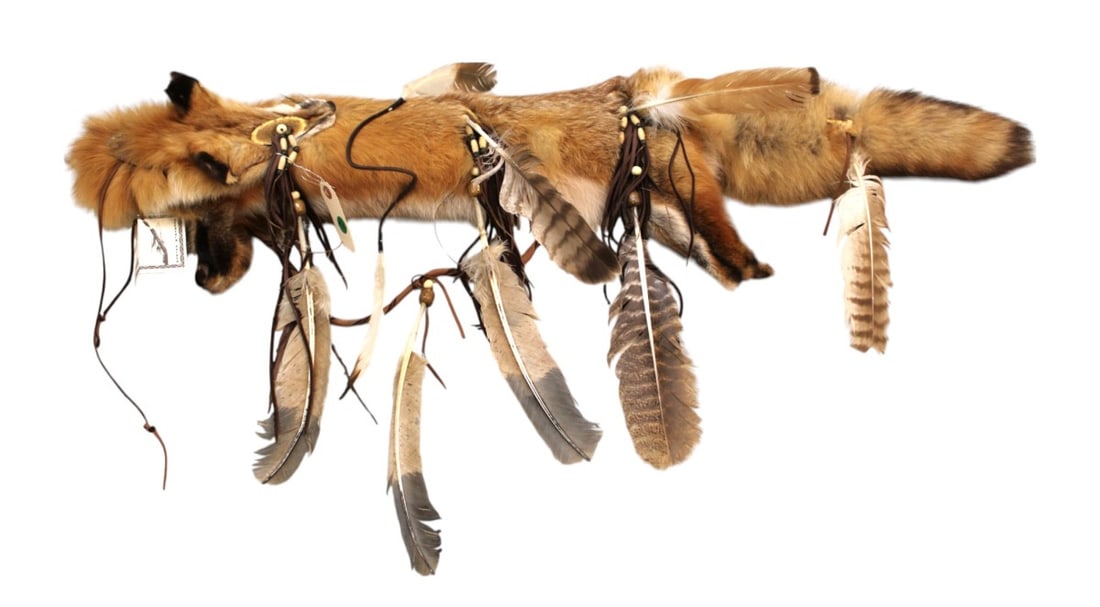 Deer skin quiver with tag, fox jaw, antler beaded: Deer skin quiver with tag. Quiver is fixed with fox jaw bone, antler disc beads and eagle feathers, some feathers are lose. Approx. with tail. 40"l x 5" diameter