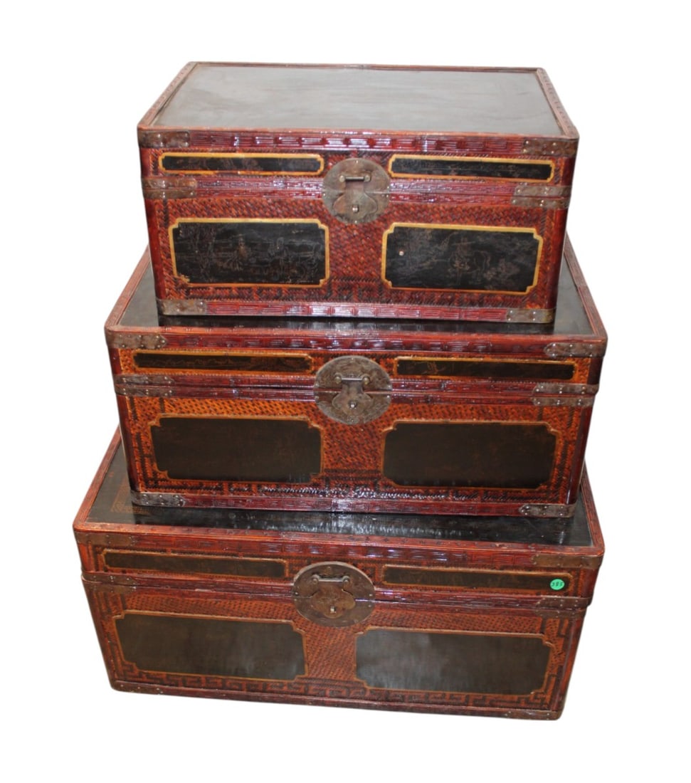3 Chinese sg. graduating designer trunks: 3 Chinese signed graduating trunks, mahogany frame with black decorated tops and sides they can fit inside of each other, nice for decorating. Largest 14"h x 29"w x 19"d