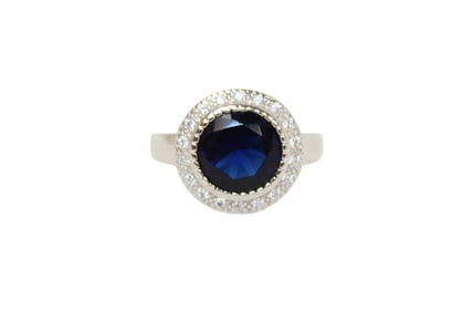 Genuine 4 ctw sapphire with white topaz ring