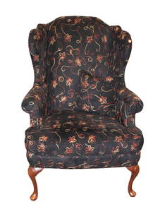 Cool high back upholstered wing back chair: Cool high back upholstered wing back chair, queen anne shell carved with string decorated upholstery in the black, structurally sound and in good condition, no noticeable issues. 44"h x 32"w x 27"d se