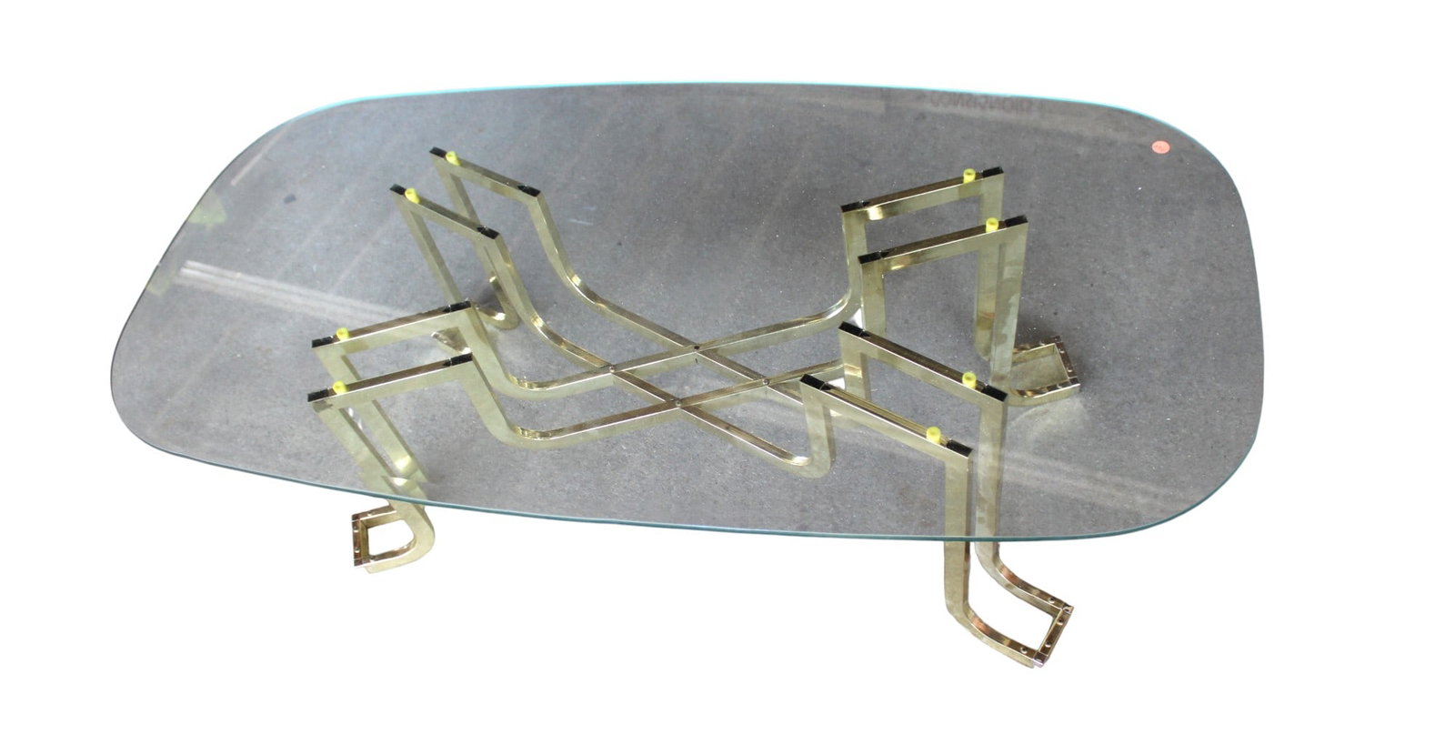 Vintage brass and glass coffee table: Vintage brass and glass coffee table, structurally sound. Glass is good. 17"h x 52"l x 25.5"w