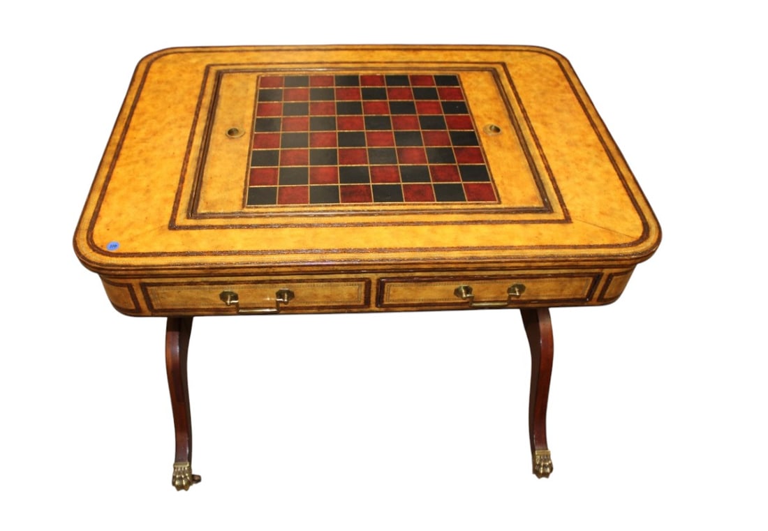 Beautiful Maitland Smith leather wrapped game table: Beautiful Maitland Smith leather wrapped game table with reversible chess and backgammon game with game pieces, mahogany with duncan phyfe style legs with harry brass caps, original finish, structural