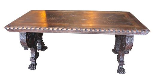 Antique quartersawn paw foot library table  manner of Horner