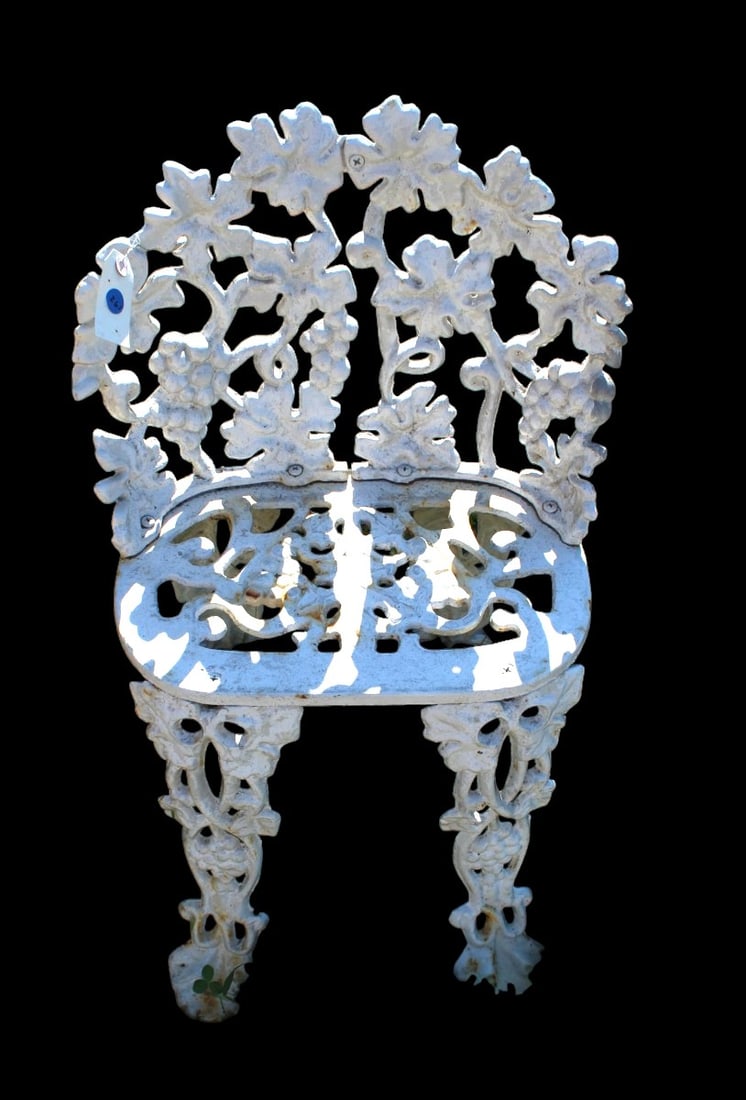 Vintage cast iron ornate carved garden chair: Vintage cast iron ornate carved garden chair, structurally sound has some rust and paint loss. 27.5"h x 16"w x 14"d seat height 15"