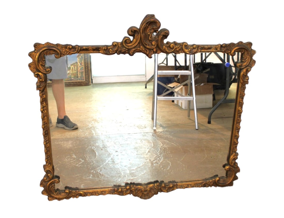 Antique carved wood and gesso hanging mirror: Antique highly carved wood and gesso hanging decorator mirror with some wear on edges. 34.5"h x 38.5"w x 2"d