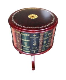 Petite round faux book and mahogany finish table