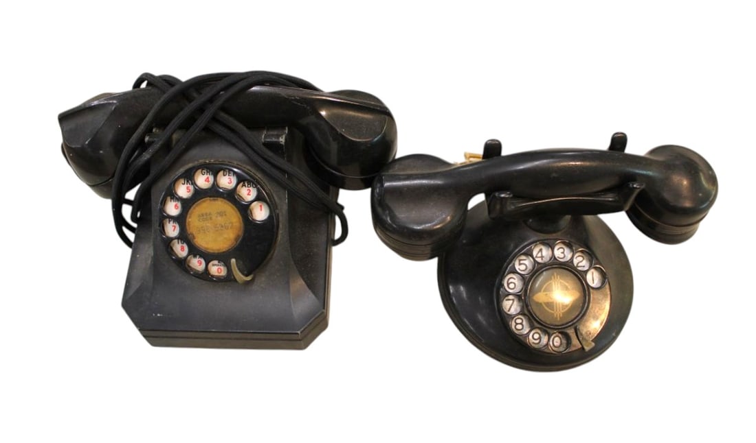 2 semi antique black rotary phones: 2 semi antique black rotary phones, structurally sound and original found condition.