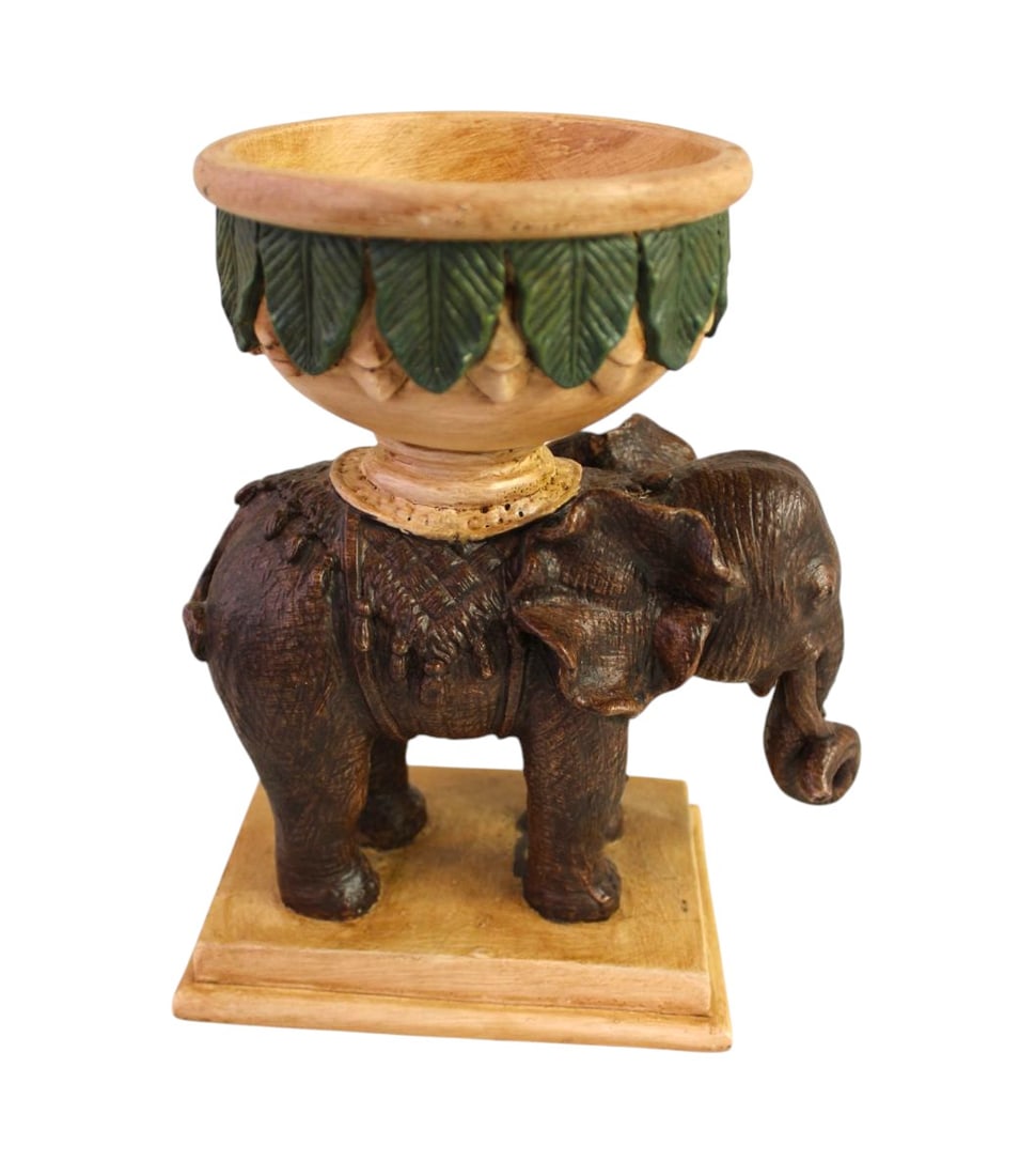 Standing elephant elevated bowl: Standing elephant elevated bowl. 9"h x 8" w x 4"d