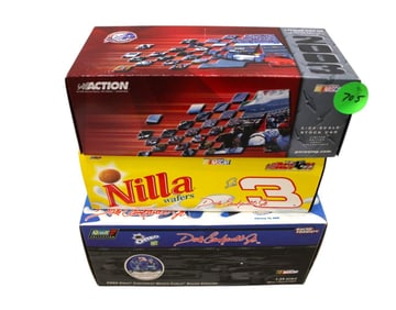 3 Die Cast 1/24 scale cars in boxes, mixed