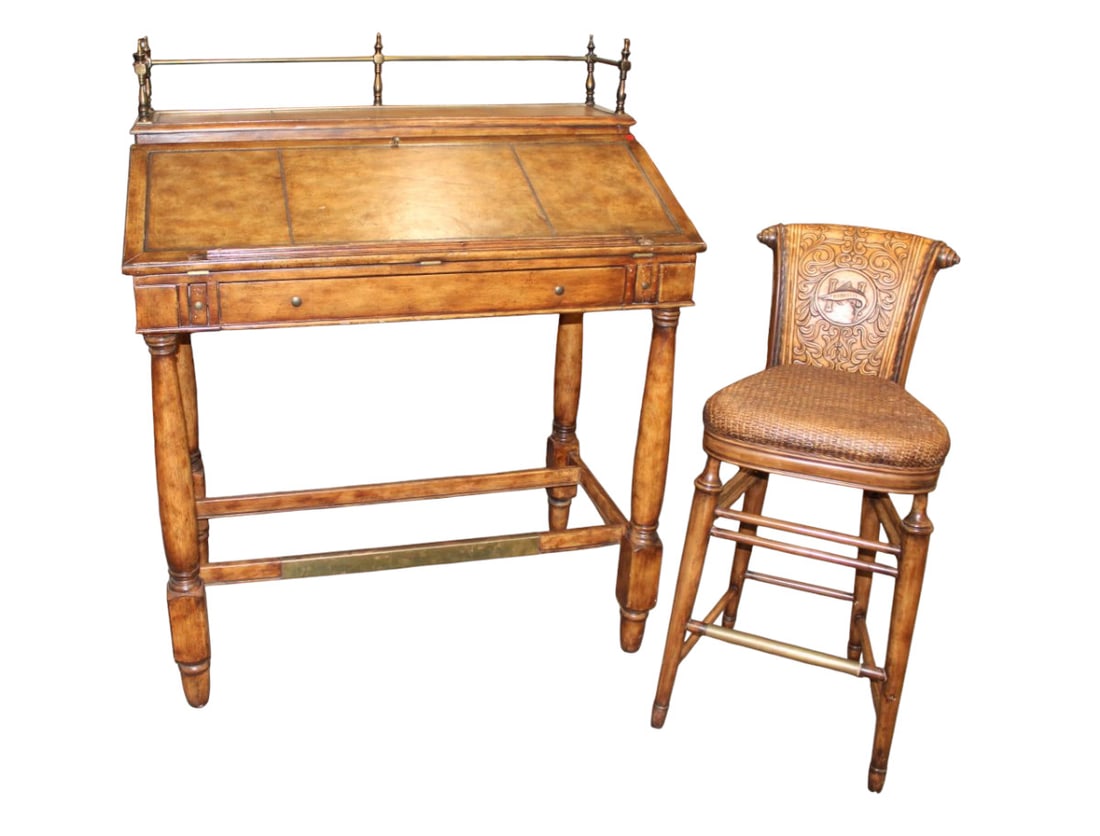 Thomasville Hemingway high slant front writing desk: Thomasville Ernest Hemingway Collection high top slant front brass galleried writing desk, leather wrap style finish with wicker tooled leather back chair with marlin design, is structurally sound wit