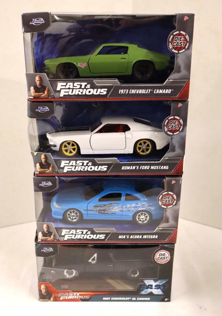 4 Jada Fast and Furious 1/32 diecast cars unopened: 4 Jada Fast and Furious 1/32 scale diecast cars in original packaging.