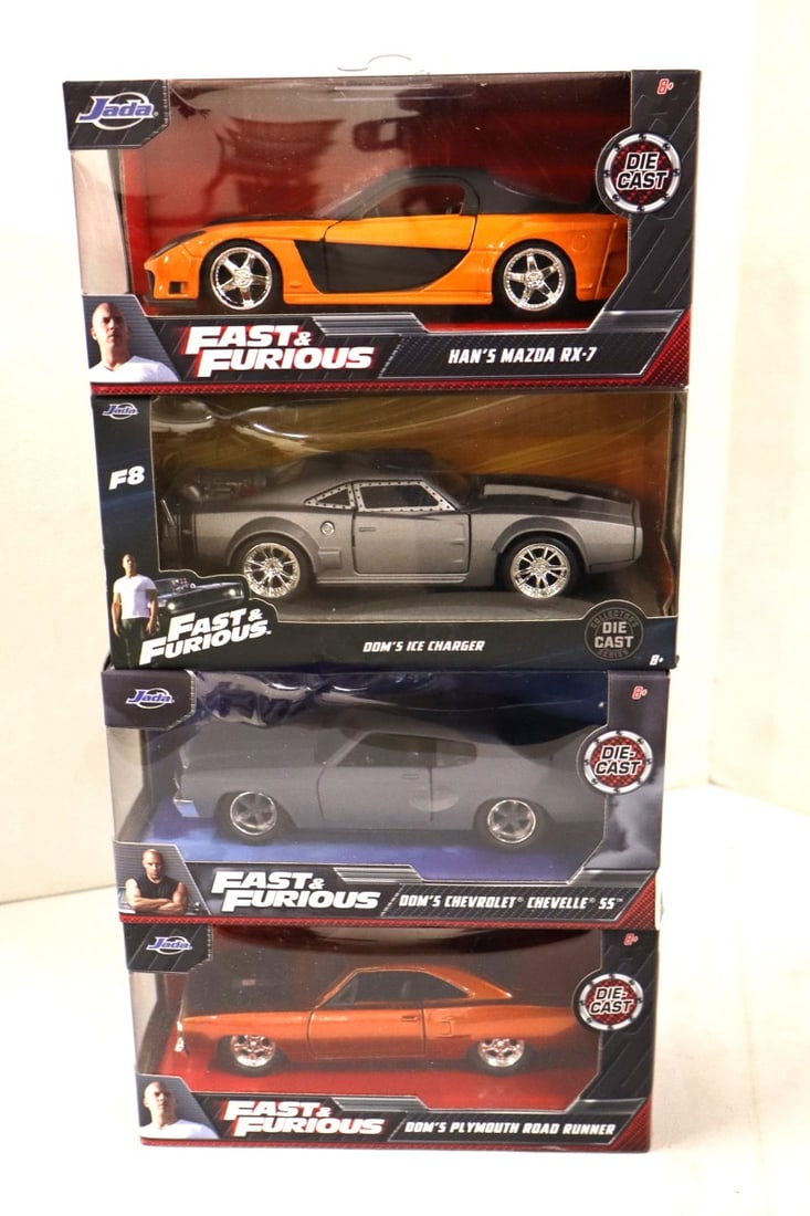 4 Jada Fast and Furious 1/32 diecast cars unopened: 4 Jada Fast and Furious 1/32 scale diecast cars in original packaging.