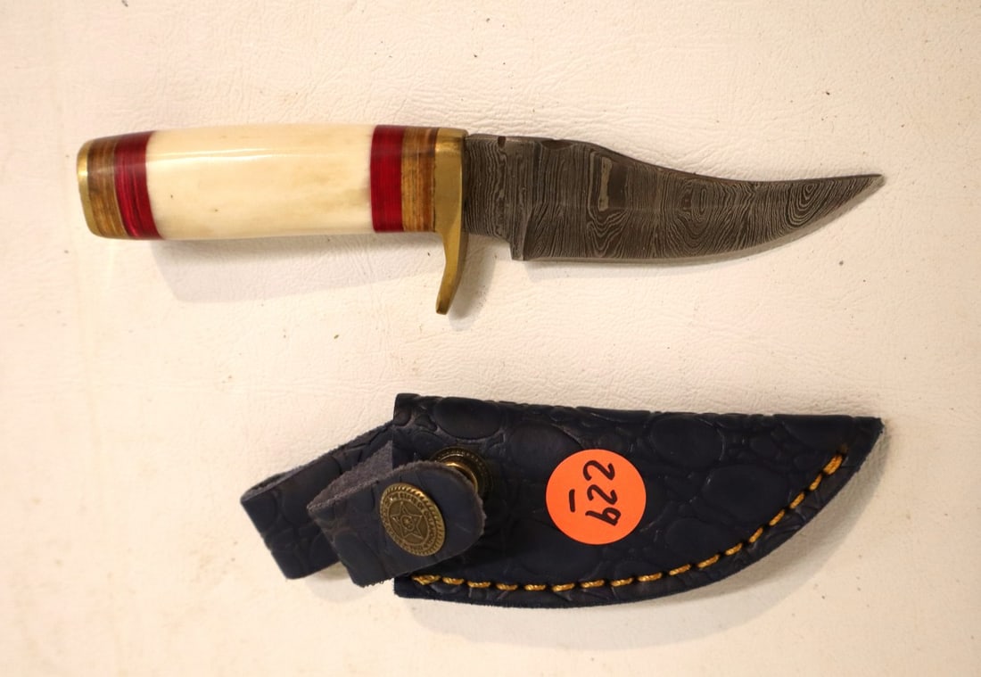 Damascus knife with tri color handle and leather sheath: Handcrafted knife with leather sheath damascus blade with tri colored bone style handle and belt loop with leather sheath. 5"l