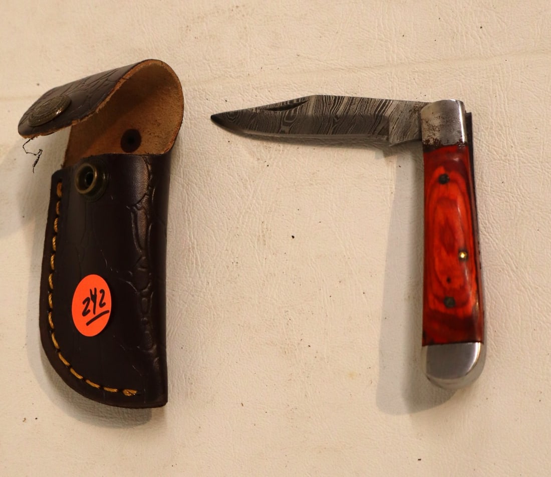 Damascus folding knife with mahogany style handle and leather sheath (1 of 2)