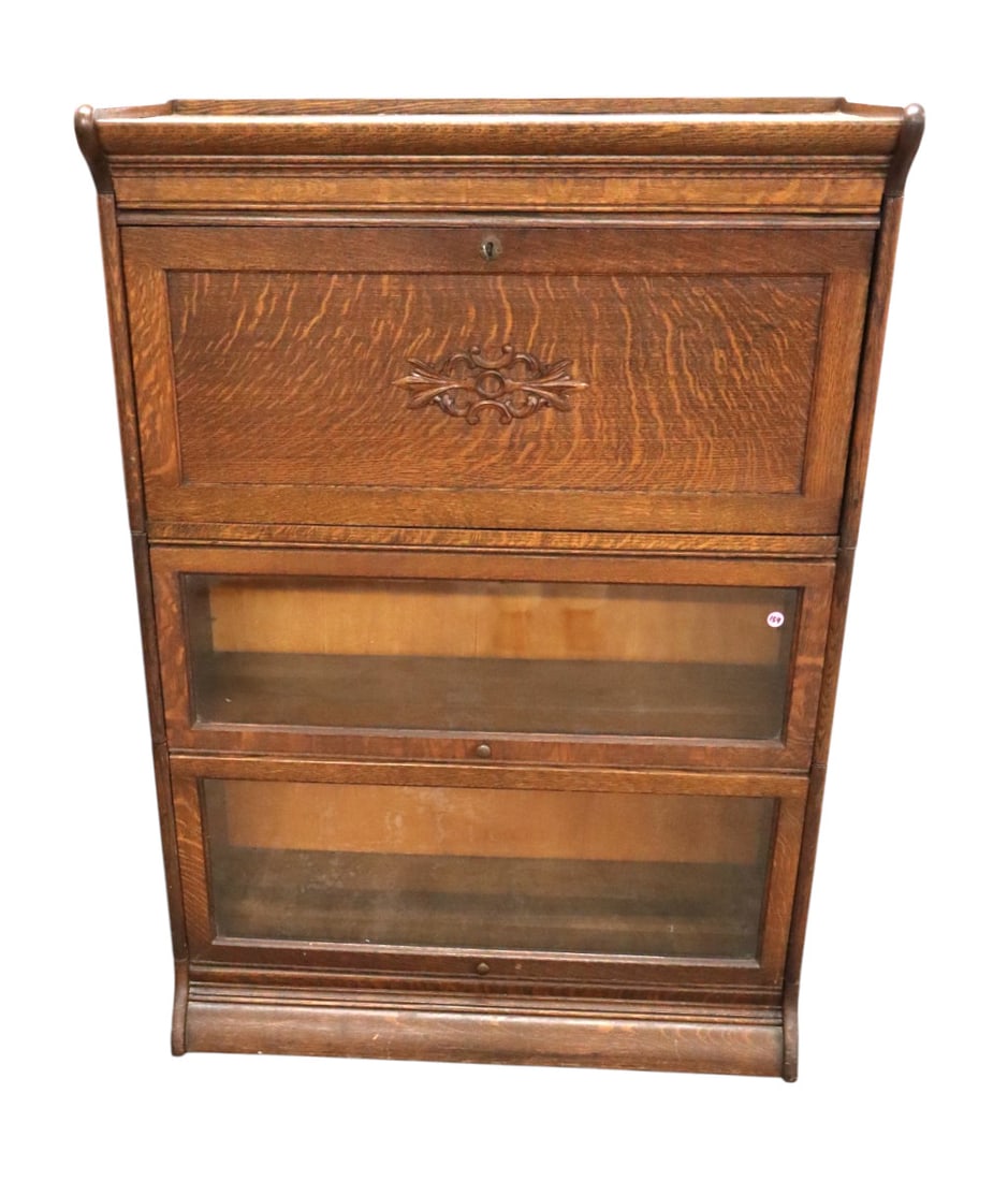 Antique carved oak 3 stack barrister bookcase w/desk: Antique carved oak 3 stack barrister bookcase with desk nice interior with key in the original finish structurally sound and in good condition. Footprint: 48.5"h x 34"w x 14"d