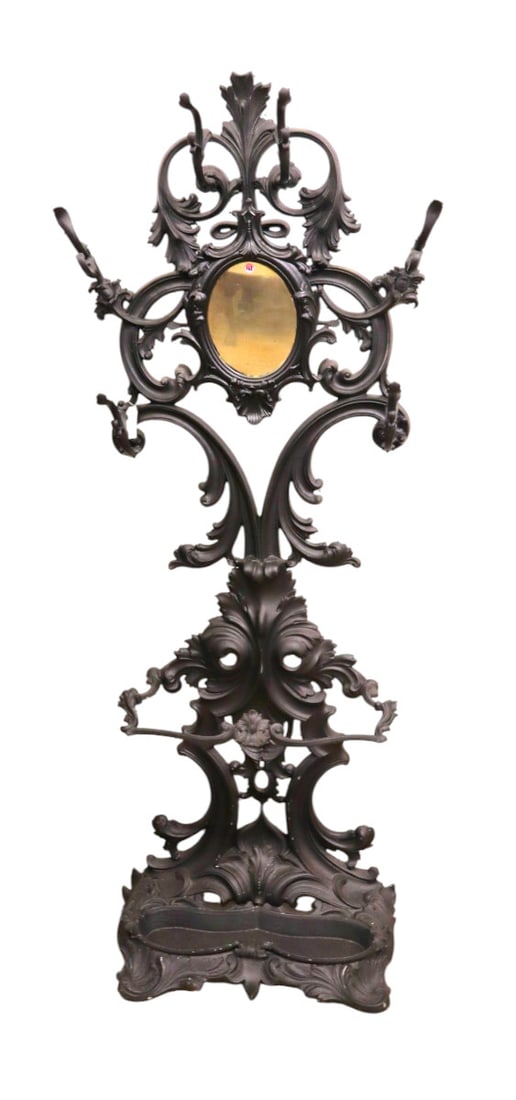 Antique cast iron mirror hall rack with drip pan: Antique cast iron mirrored hall rack with umbrella stand with drip pan, nice hooks, has been repainted over the years, structurally sound and in good condition. 78"h x 32"w x 14"d