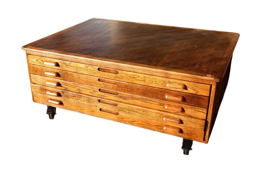 Industrial oak map cabinet coffee table on wheels: Industrial 5 drawer oak map cabinet coffee table on wheels, custom made, nice finish structurally sound and in good condition. 19.5"h x 48"w 36"d