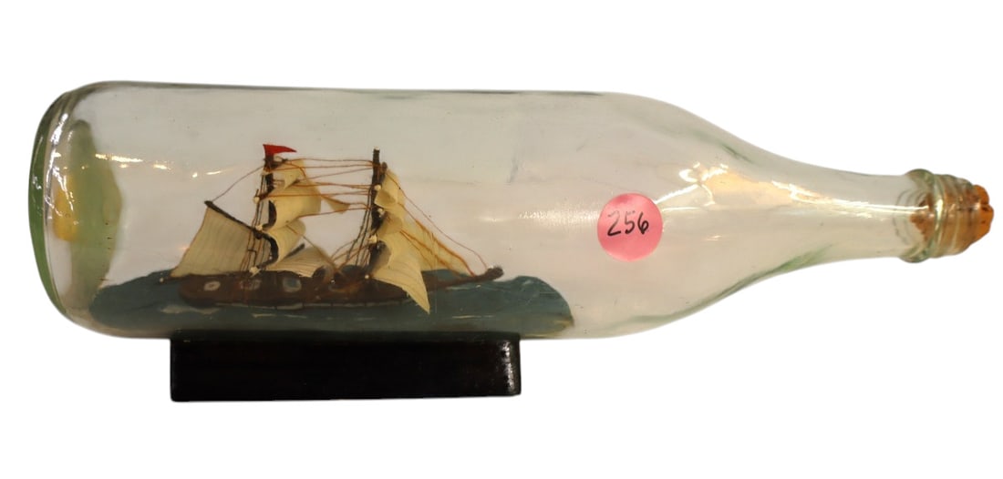 Vintage ship in glass bottle on stand (1 of 2)