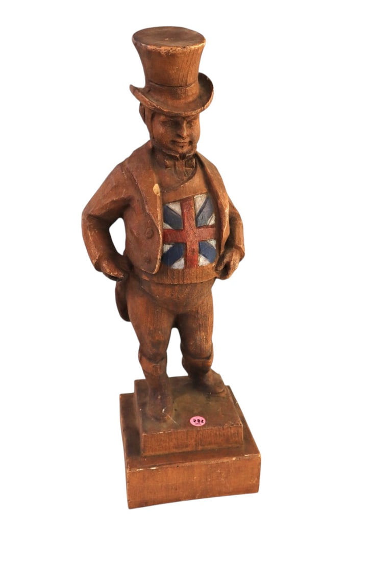 British store display figure in composition: British store display figure in composition, original finish. 22"h x 7" x 7"