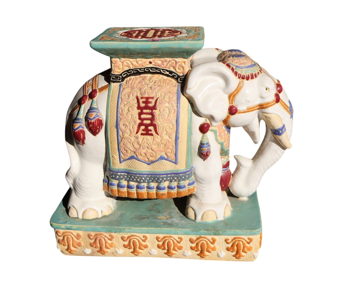 Porcelain Asian elephant multi-color garden stool: Porcelain Asian elephant multi-color garden stool in good condition no issues seen. 17"h x 19"l x 8"w