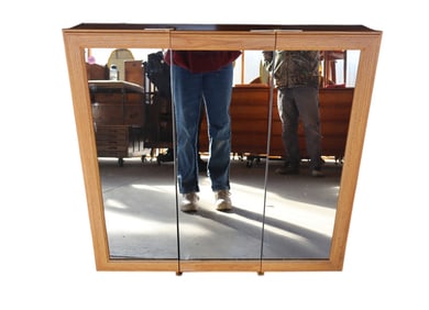 Oak 3 section mirrored   medicine cabinet. 29"h x 30"w