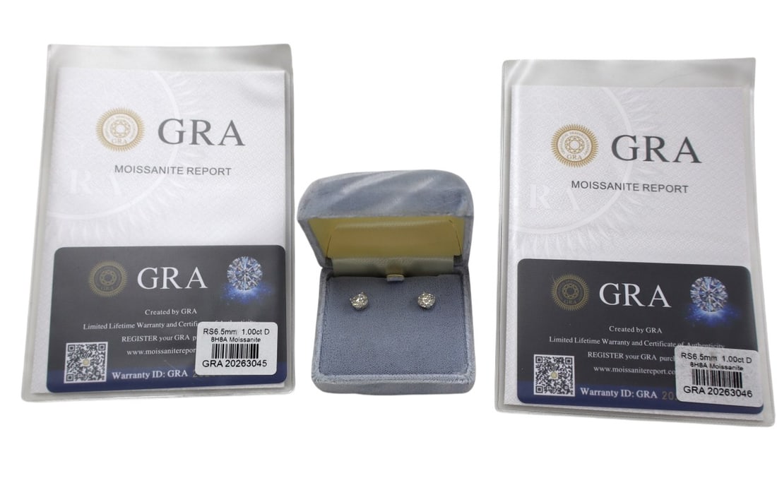 Stunning round moissanite 2ct. stud earrings s/s w/GRA: Stunning round moissanite 2ct. stud earrings in sterling silver settings each with their GRA 1ct. Certifications with light gray gift box. Approx. size
