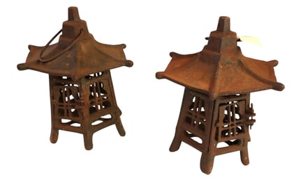 Pair of cool vintage cast iron pagoda candle lamps