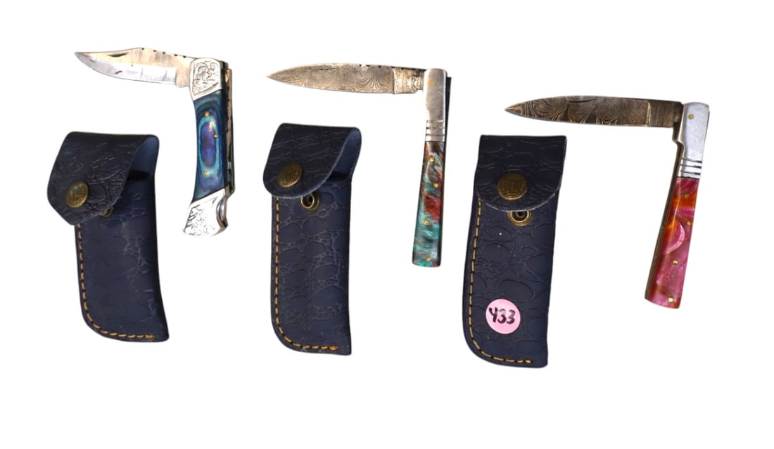 New 3 fancy folding knives with damascus blades: New fancy 3 folding knives with damascus blades with leather sheaths with belt loops. 5"l x 2"w