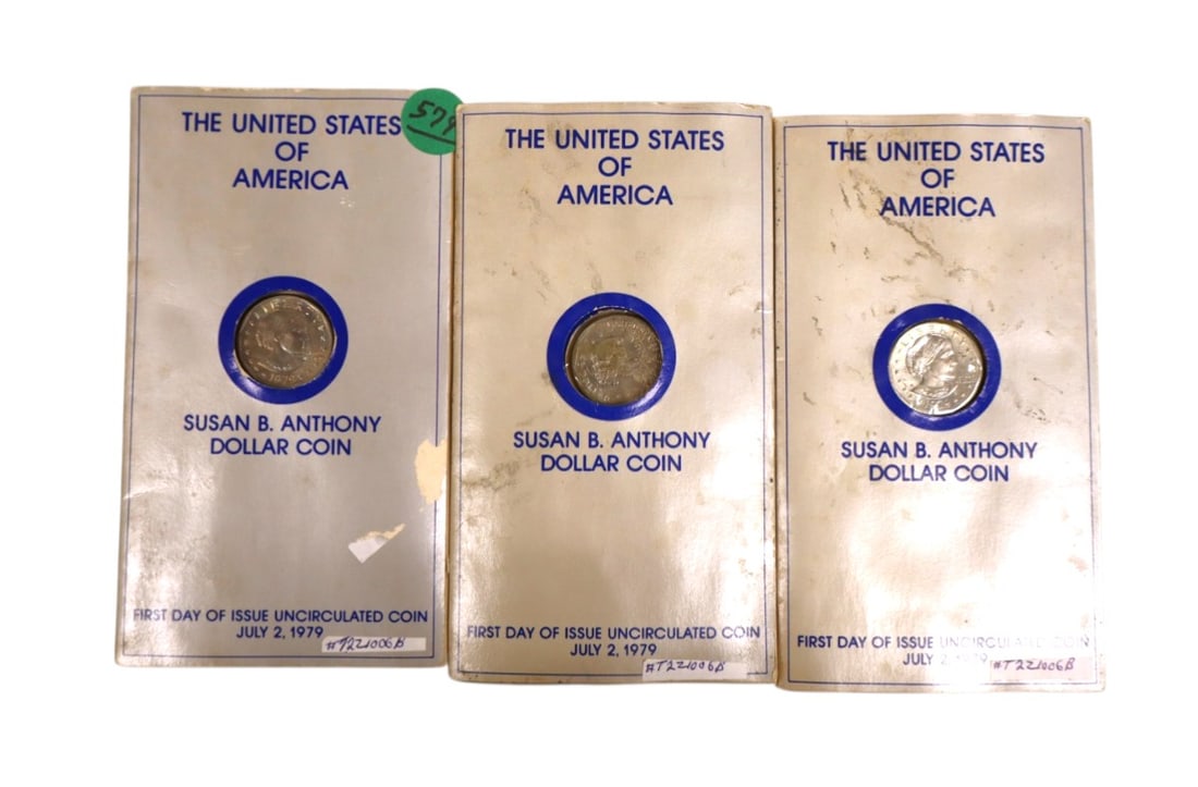 3 US Susan B Anthony First Day Issue uncirculated coins in paper: 3 US Susan B Anthony First Day Issue uncirculated coins in paper