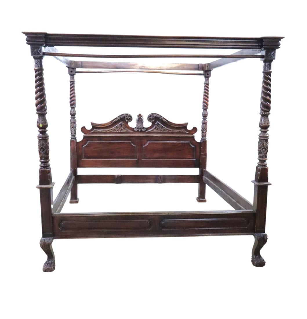 Highly carved & ornate mahogany king canopy bed: Highly carved and ornate solid mahogany king size canopy bed with rails, original finish, structurally sound and in good condition. Footprint: 83.25"h x 85"w x 90"l