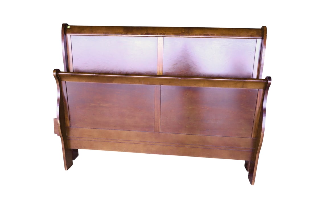 Queen sleigh bed in cherry finish original finish: Queen size sleigh bed in cherry finish with rails and slats, original finish, structurally sound and in good condition. Footprint: 47"h x 62.5"w x 88"l