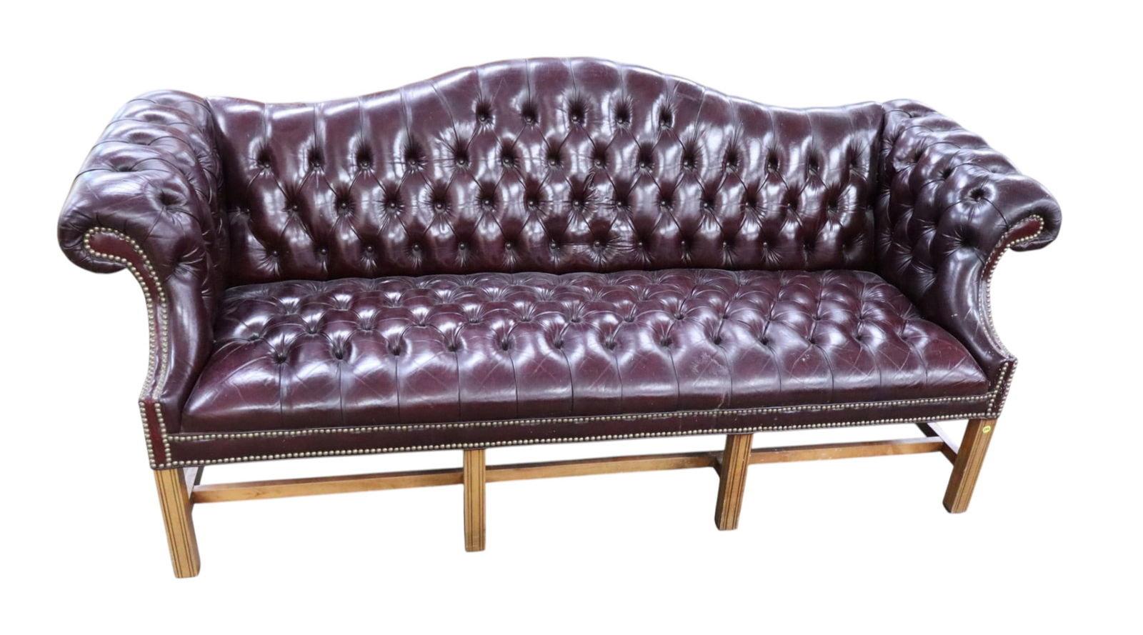 Chippendale style button tuft burgundy leather sofa: Chippendale style button tuft burgundy leather sofa on mahogany frame, no rips or tears, some scratches, needs cleaned, see photos, structurally sound. 35.5"h x 83"l x 32"d seat height 18"