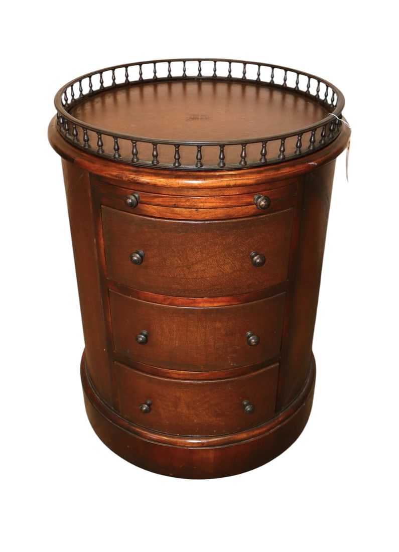 Theodore Alexander galleried leather accent table: Theodore Alexander quality round all hand tooled leather wrapped with bronze gallery and leather pull out tray 4 drawer accent table in the mahogany, original finish, structurally sound and in good co