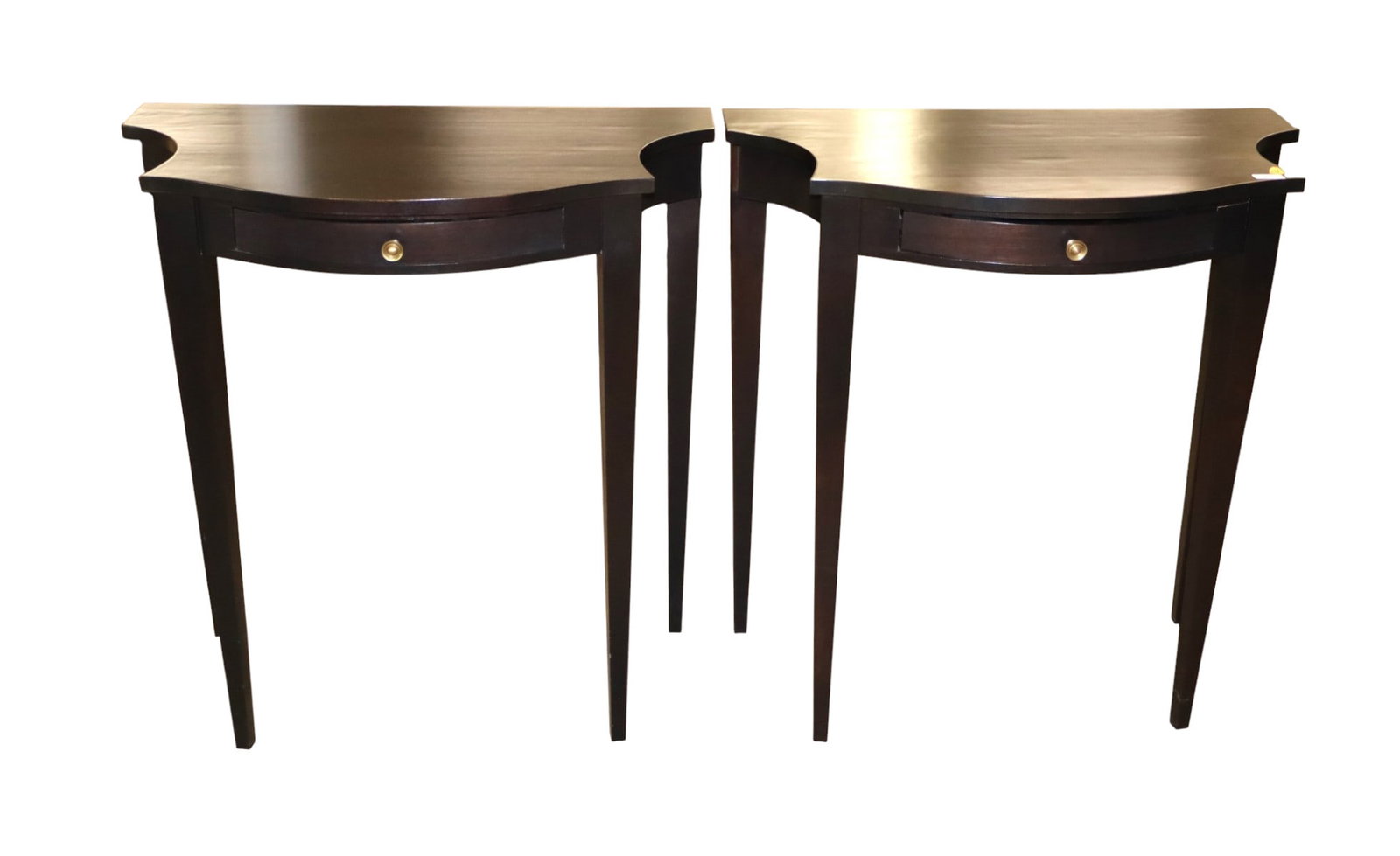 PR sleek designer McLain Wiesland console tables: Pair sleek designer McLain Wiesand finishing and decorative arts Baltimore Maryland console tables with taper legs and 1 drawer in the black finish, original finish, structurally sound and in good con