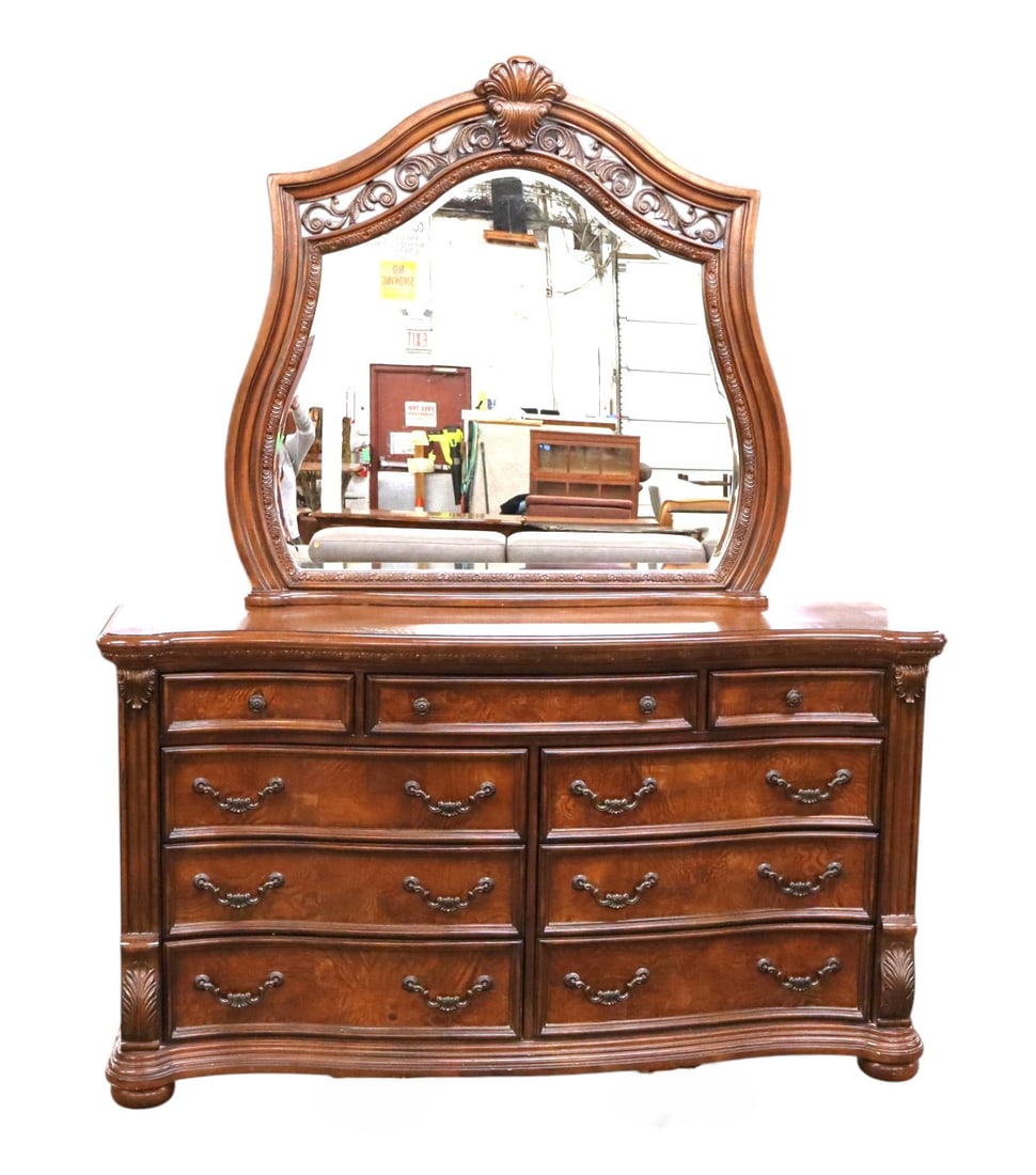 Contemporary serpentine low chest: Contemporary carved burled walnut 9 drawer serpentine low chest with fancy beveled removeable mirror by American Signature Furniture with cedar lined bottom drawer, original finish, structurally sound